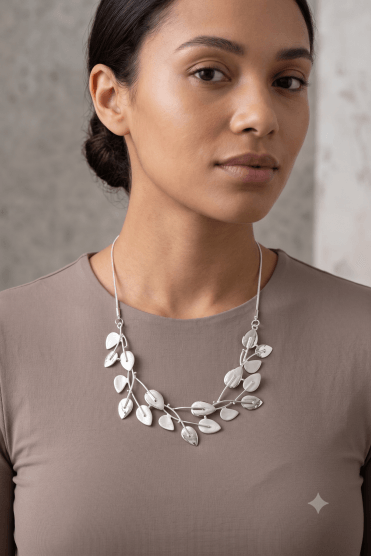 Glimmering Silver Serpent Necklace With Matte And Shiny Leaves