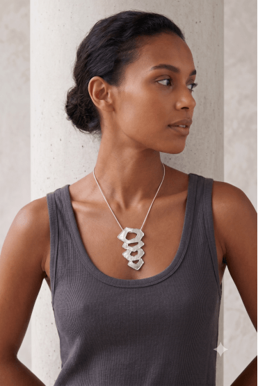 Sleek Silver Serpent Chain Necklace With Abstract Oval Pendant