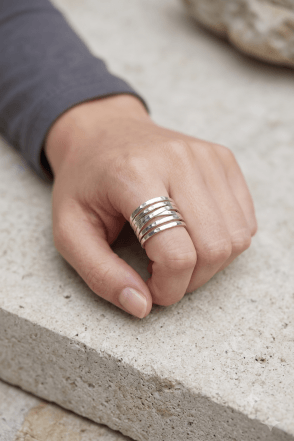 Worn Silver Hammered Ring With Spring Design